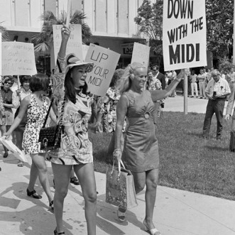 Mini-skirted women march in protest of the midi skirt, July 13, 1970, in Miami, Fla. The women are afraid stores will stop stocking the mini skirt and they want freedom of choice in their attire. (AP Photo/Jim Kerlin)